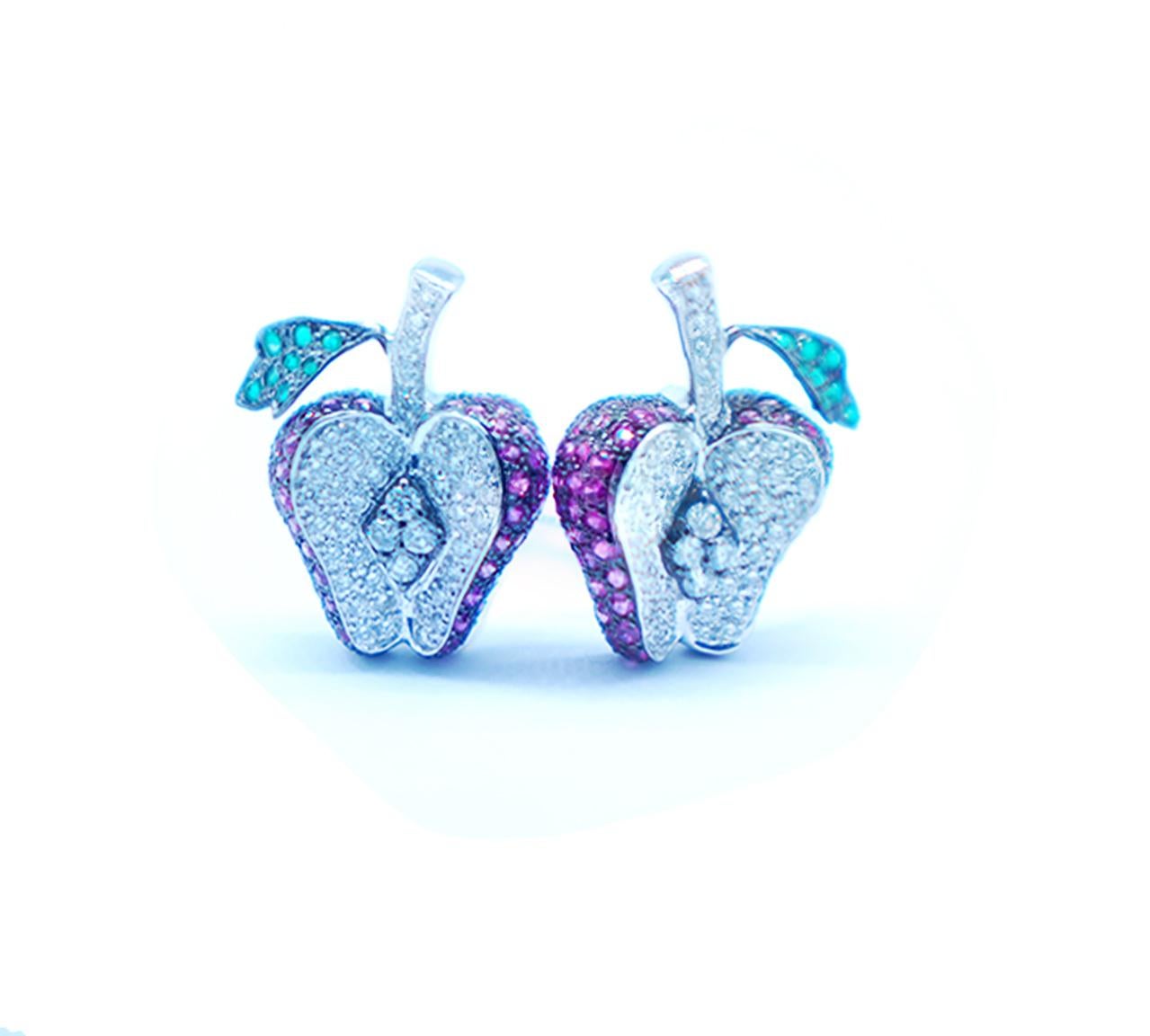 Ruby and Diamond Pave Apple Earrings 18 Karat Gold Tsavorite Green having an estimated total weight of 4 carats.

These are a gorgeous pair of earrings where the Apple is three-dimensional & shows off the artist careful execution of a fine piece of