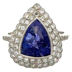 4.00 Carat Triangular Tanzanite and Diamond Platinum Double Halo Cocktail Ring