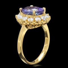 4.00 Carats Natural Tanzanite and Diamond 14K Solid Yellow Gold Ring