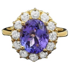 4.00 Carats Natural Tanzanite and Diamond 14K Solid Yellow Gold Ring