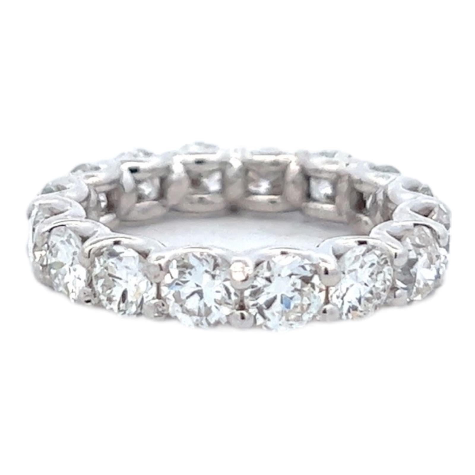 Beautiful diamond eternity wedding band handcrafted in 18 karat white gold. The ring features 16 round brilliant cut diamonds weighing 4.00 CTW set in a 'U' prong mounting. The diamonds are graded G-H color and VS clarity. The ring measures 4mm in