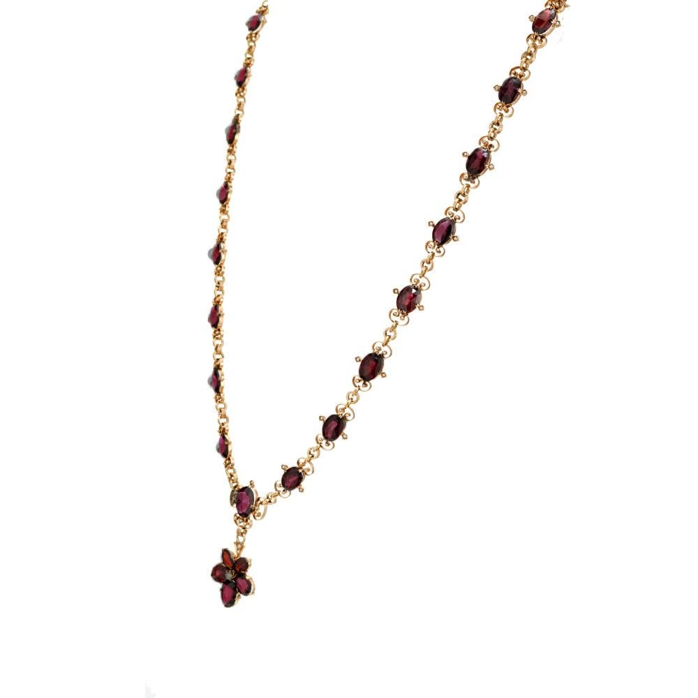 English Victorian garnet and seed pearl pendant necklace. 31 oval red/brown garnets, separated by 57 gray seed pearls and 9k rose gold designer links. circa 1900's. 22 inches long. Beautiful example of the turn of the century jewelry. 

31 oval