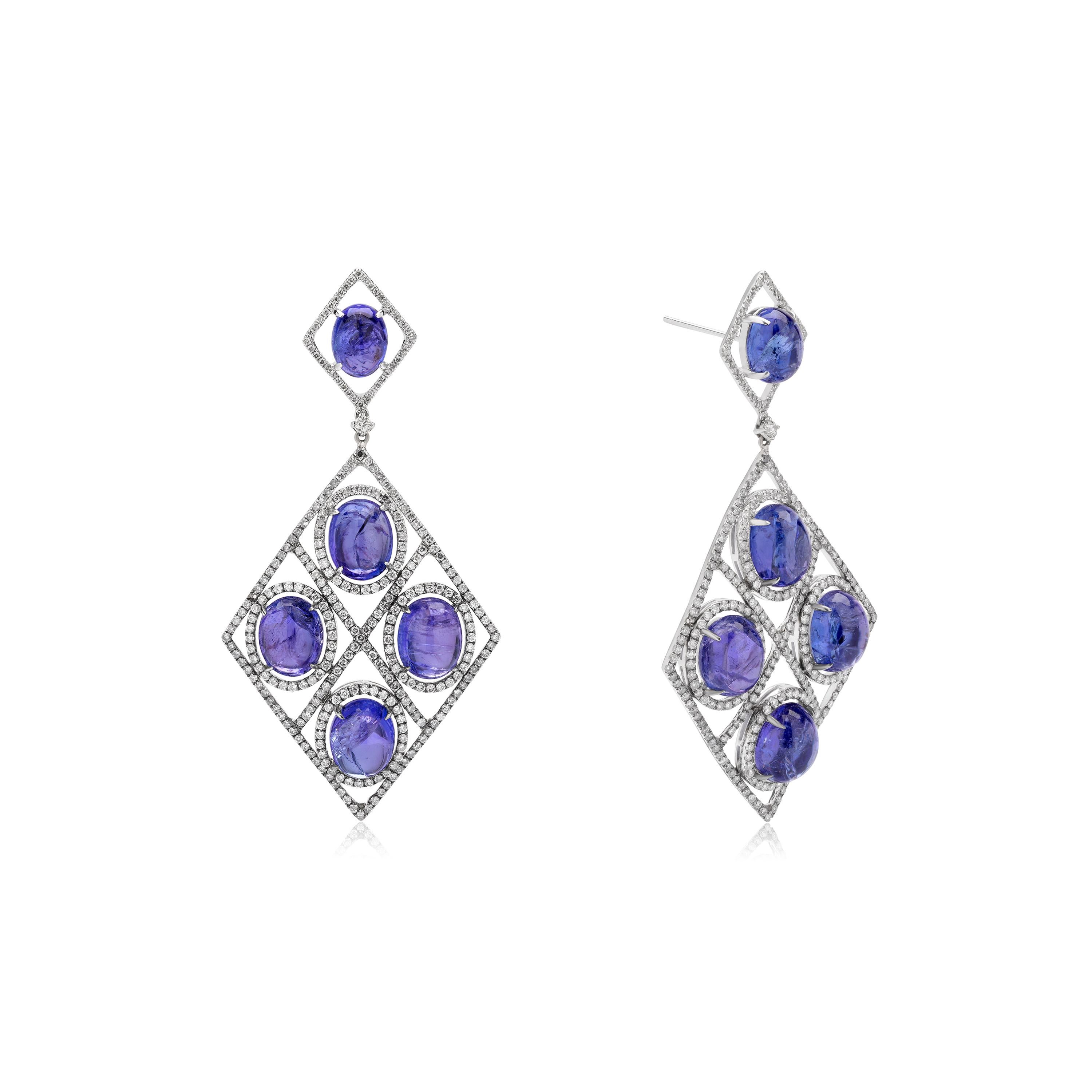 The symmetry of patterns of this diamond shaped dangle earring by Nigaam is amazingly consistent . The surmount , the drop ensemble and the four inner patterns of the drop resemble a diamond. The sturdy 40.02 carat Tanzanite and 3.86-carat diamond