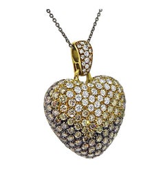 Anhänger in Herzform aus 18-karätigem Gold mit einem 4,00-Karat-Diamanten in der Farbe „Fancy Yellow“ und braunen Diamanten