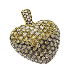 Anhänger in Herzform aus 18-karätigem Gold mit einem 4,00-Karat-Diamanten in der Farbe „Fancy Yellow“ und braunen Diamanten