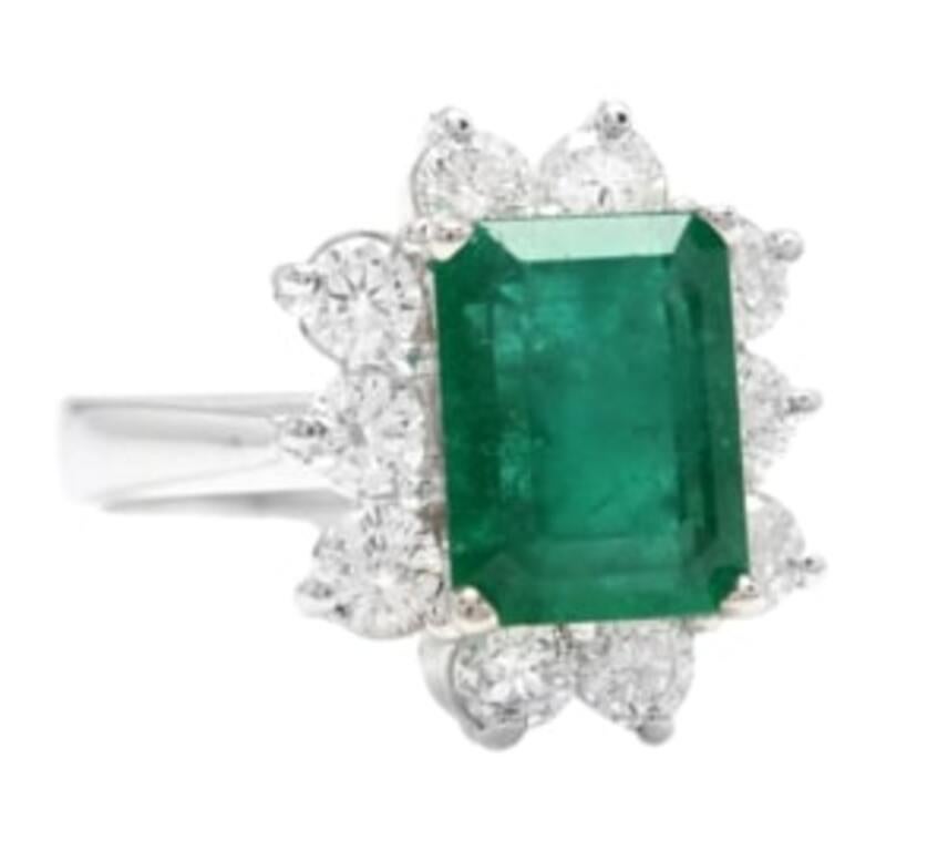 4.00 Carats Natural Emerald and Diamond 14K Solid White Gold Ring

Total Natural Green Emerald Weight is: Approx. 3.00 Carats (transparent)

Emerald Measures: Approx. 9 x 7mm

Emerald Treatment: Oiling

Natural Round Diamonds Weight: Approx. 1.00