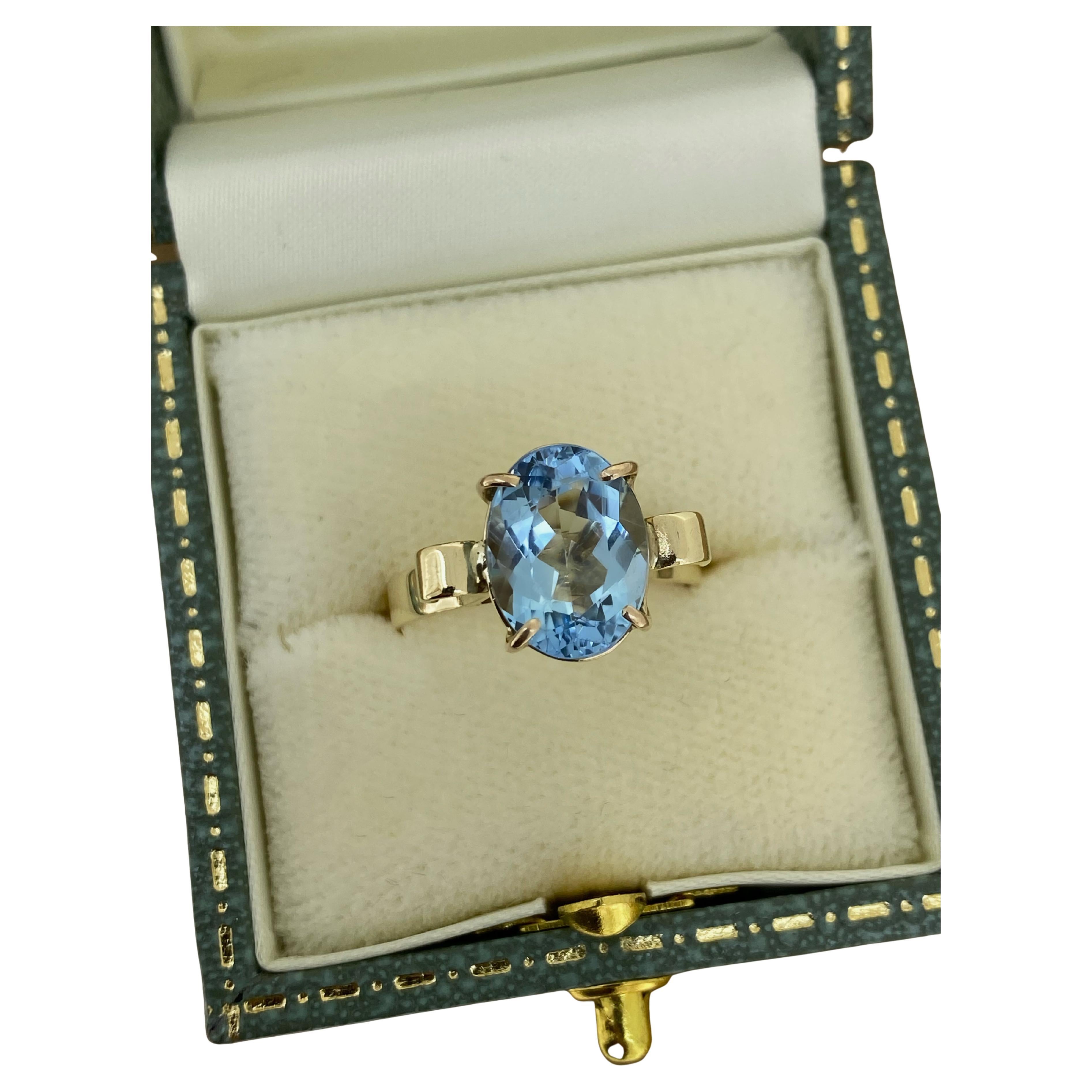 4.00ct Oval Sky Blue Natural Topaz Solitaire Vintage Ring in 9K Yellow Gold