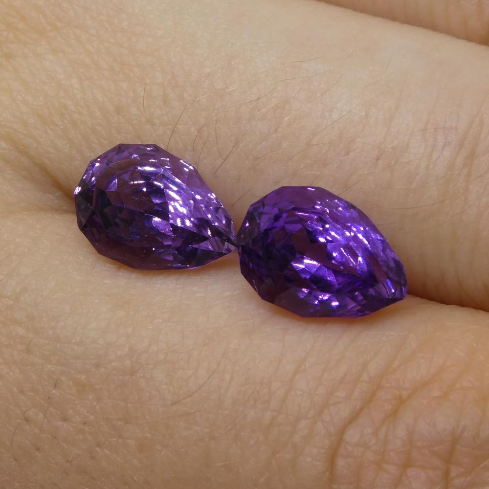 Meet Hypatia our newest fantasy cut, named after Hypatia the philosopher, astronomer and mathematician.

Description:

Gem Type: Amethyst
Number of Stones: 2
Weight: 4 cts
Measurements: 10.00 x 7.00 x 5.50 mm
Shape: Pear
Cutting Style Crown: