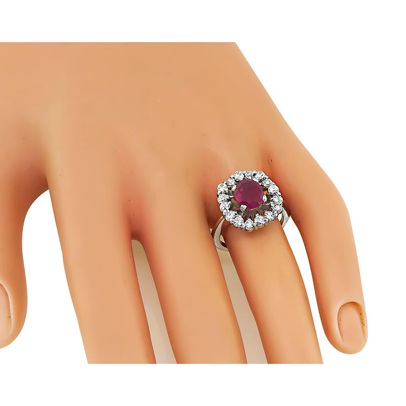 This is a charming 14k white gold ring and earrings set. The set features lovely oval cut rubies that weigh approximately 4.00ct. The rubies are accentuated by sparkling marquise, baguette and round cut diamonds that weigh approximately 3.25ct. The