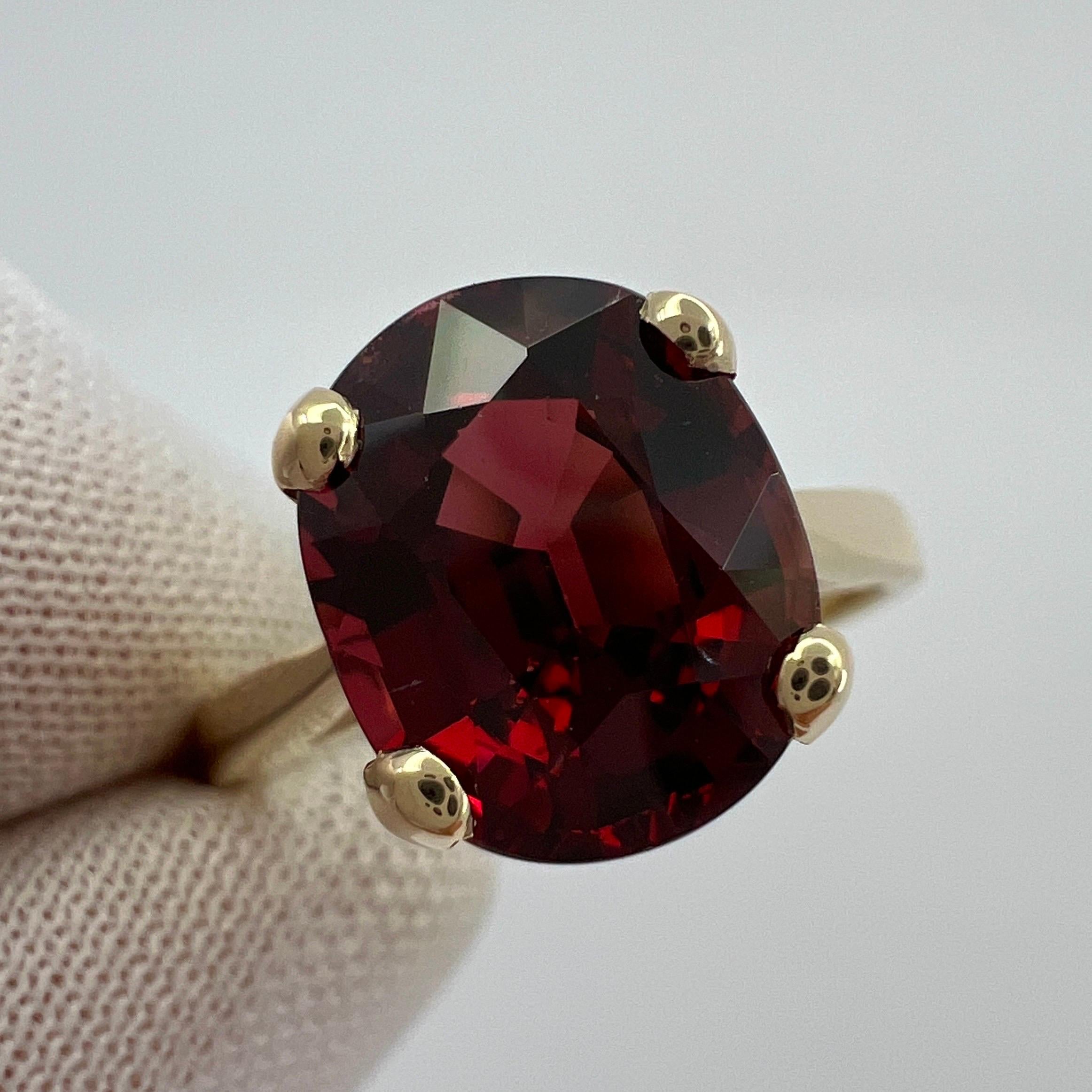 Vivid Cherry Red Rhodolite Garnet Oval Cut Yellow Gold Solitaire Ring.

4.00 Carat garnet with a stunning vivid cherry red colour and very good clarity, very clean stone.

Also has an excellent quality oval cut which shows the fine colour to best