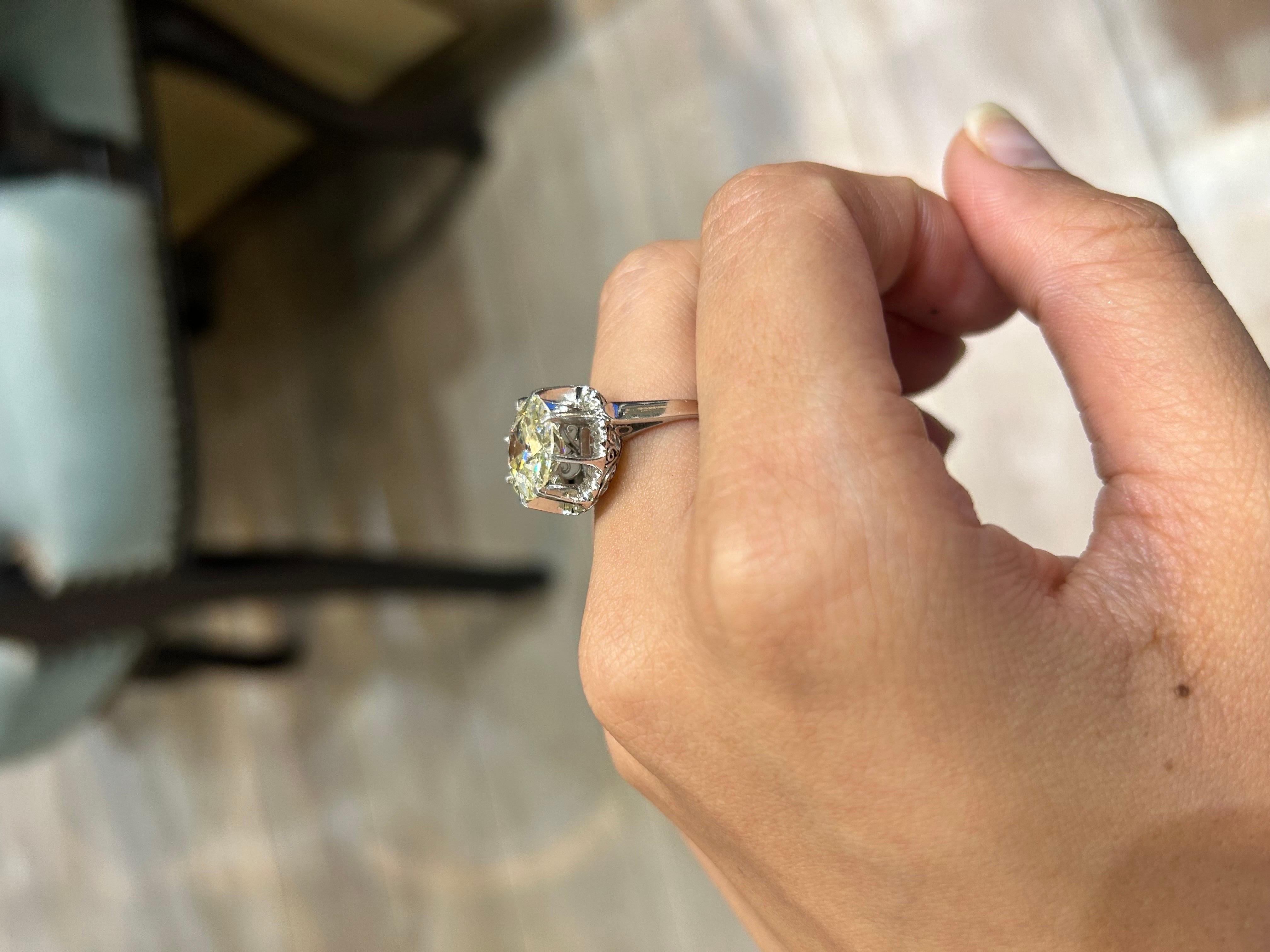 An antique piece, 4.01 carat solitaire ring set in 18k white gold. K/L color, VS/SI quality.