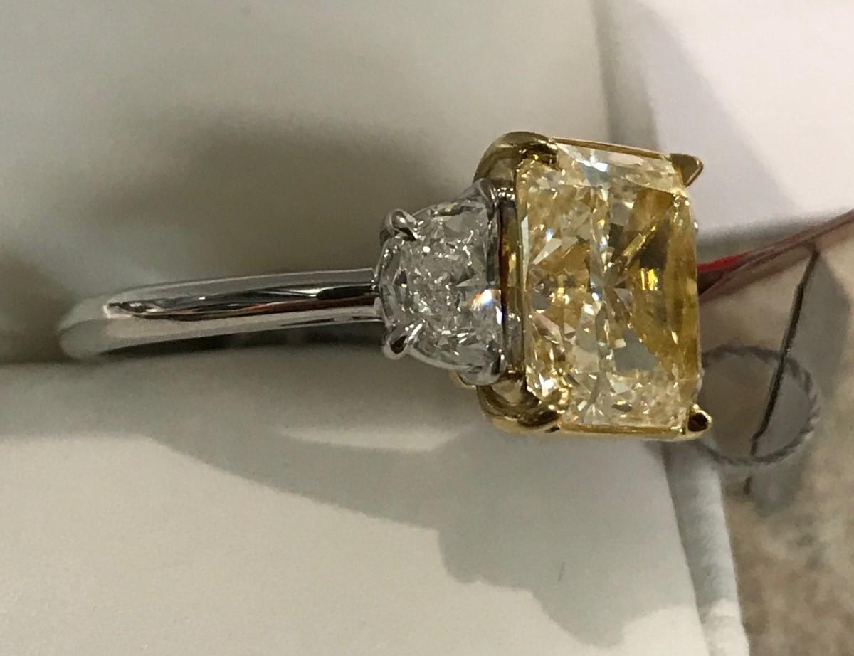 4.01 Carat Radiant Diamond Set with Half Moons in Gold and Platinum Mounting 1