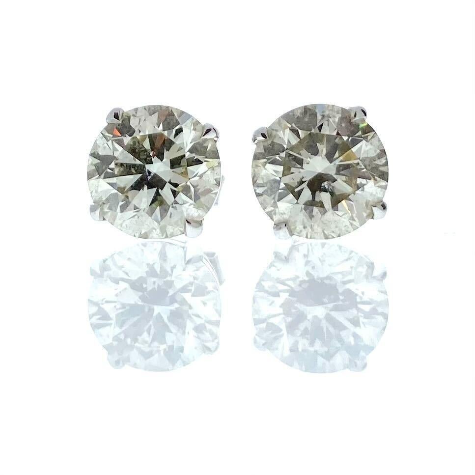 Contemporary 4.01 Total Carat Weight EGL Certified Round Diamond Studs In 14k White Gold For Sale