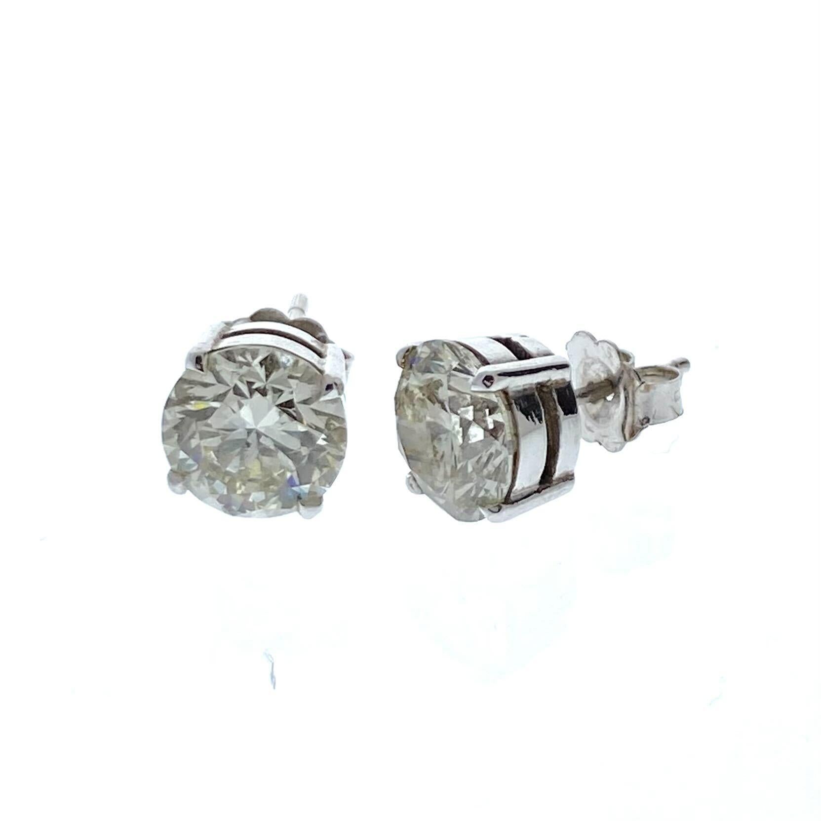 Round Cut 4.01 Total Carat Weight EGL Certified Round Diamond Studs In 14k White Gold For Sale