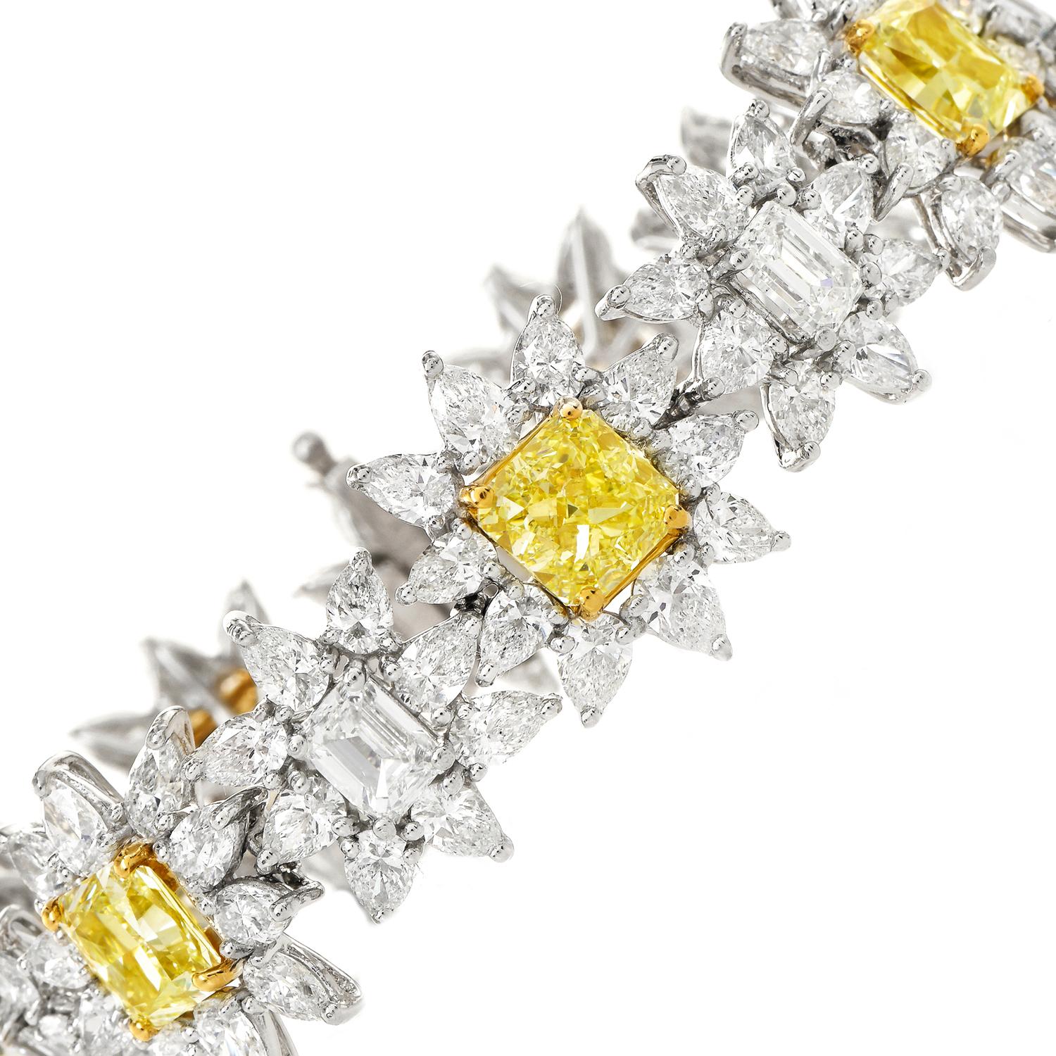 This alluring bracelet was crafted in Luxurious Platinum and accented by 18K yellow gold prongs.
Prominently features in the center 70 Natural  Fancy Light Yellow Diamond, Modified Cushion Cut, 13.35  carats, and VVVS1 to VS1 clarity all with GIA