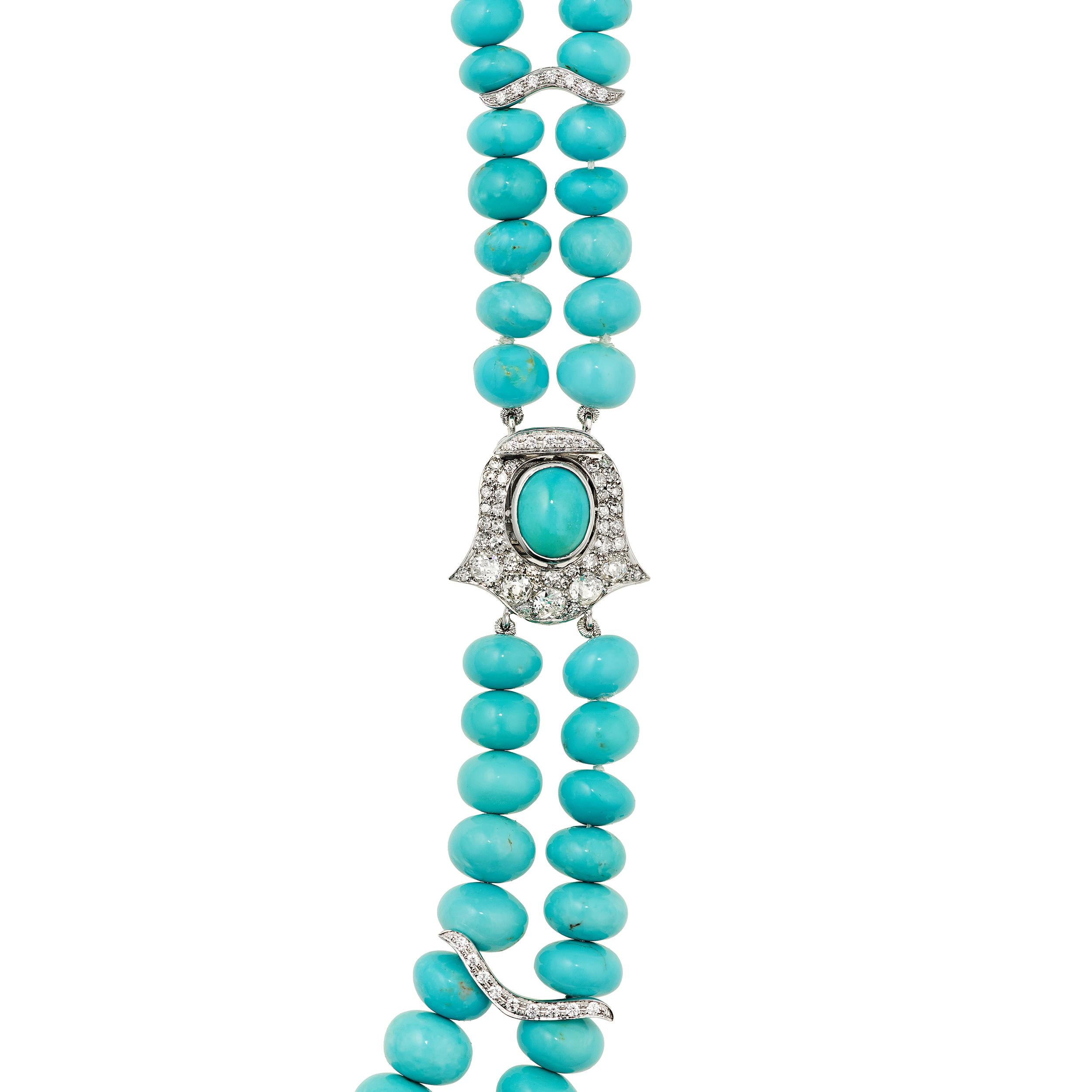 Ultra fine quality Sleeping Beauty Turquoise Rondelles ranging from 6.5 - 12.5 mm in a graduated double strand necklace.  The focal point on the side of the necklace is also the clasp, which is a vintage treasure renewed for modern wear.  The 4