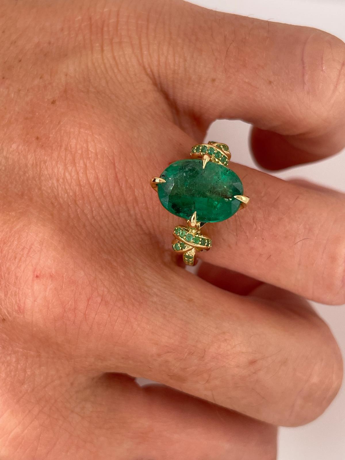4.01ct Oval Cut Emerald Forget Me Knot ring with Emeralds in 18ct yellow gold For Sale 4