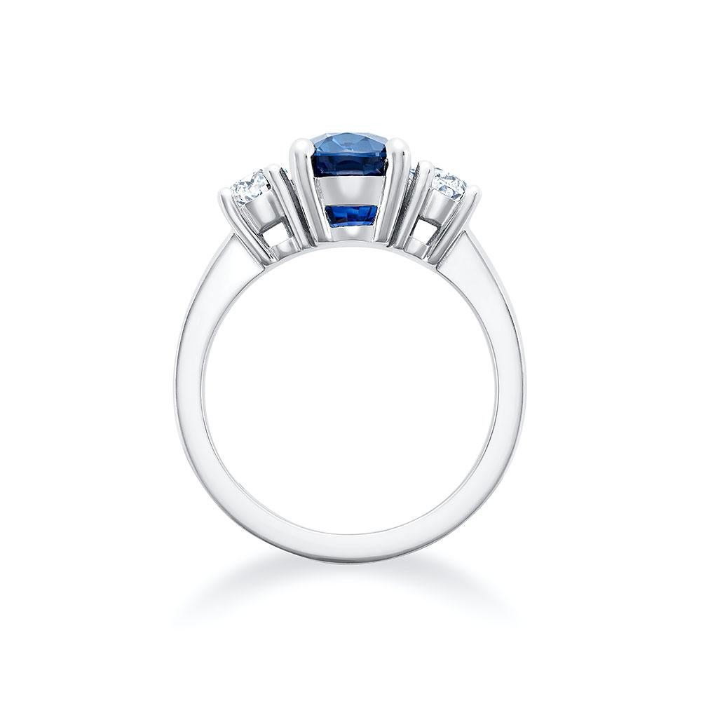 This one-of-a-kind 3-stone ring features a 4.01ct GIA certified Ceylon sapphire, accented by two GIA certified oval diamonds in platinum.

•Sapphire- 4.01 carats, heated-GIA certified
•Oval Diamonds- 1.02 carats total weight
•D-E/VS2 in quality GIA