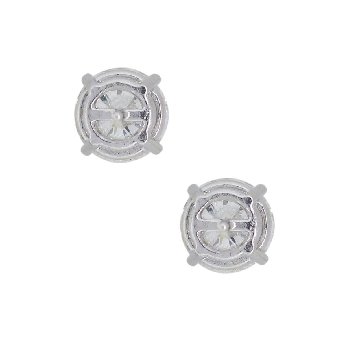 Round Cut 4.01 Carat Total Weight Round Brilliant Diamond Stud Earrings