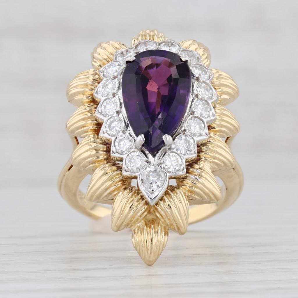 Gemstone Information:
- Natural Amethyst -
Carats - 3.25ct (7.8 x 13 mm)
Cut - Pear
Color - Purple

- Natural Diamonds -
Total Carats - 0.76ctw
Cut - Round Brilliant
Color - G - H
Clarity - VS2 - Si1
Please note one of the diamonds is chipped.