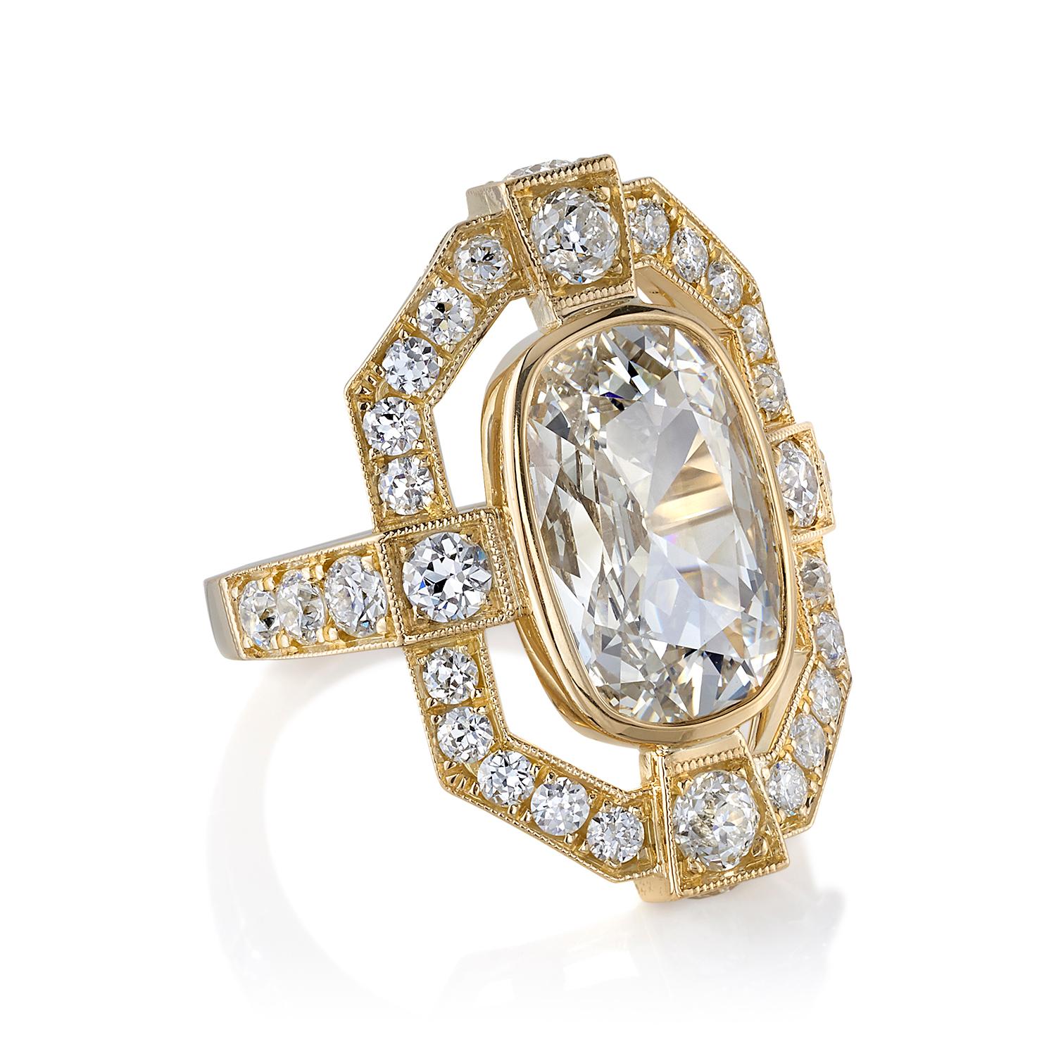 4.02ct M/VS1 GIA certified Cushion cut diamond with 1.79ctw old European cut accent diamonds set in a handcrafted 18K yellow gold mounting.

Ring is currently size 6. Please contact us about potential re-sizing.

Our jewelry is made locally in Los