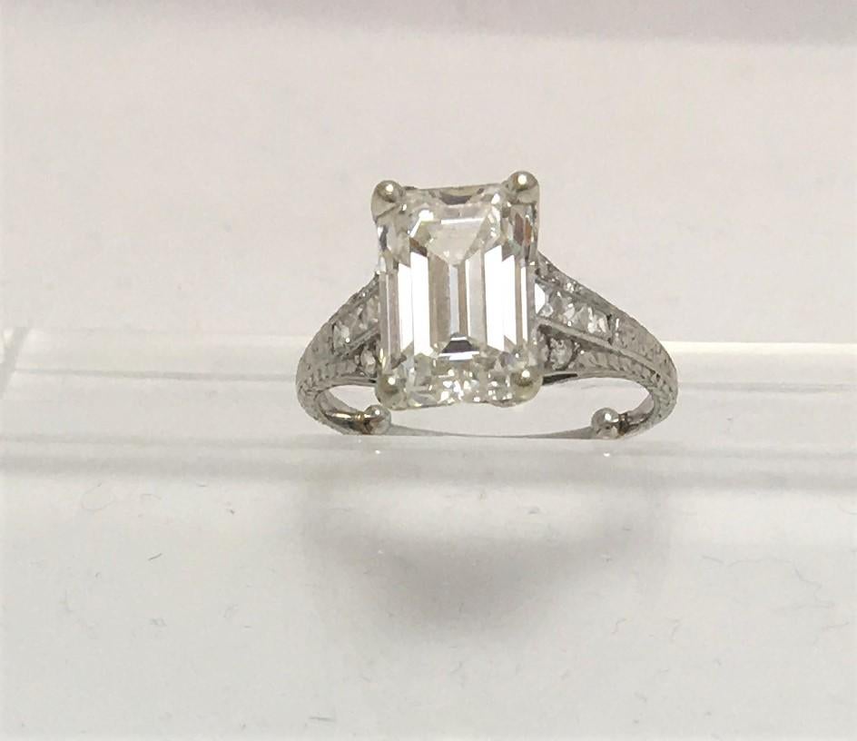 This beautiful ring Shines and Sparkles from across the room.   Center diamond is GIA certified in 2021.
23 total diamonds
Center Emerald cut diamond 3.74 carat (10.63 X 7.47 X 5.15 mm), I color, VS1 clarity
6 square brilliant cut side diamonds,