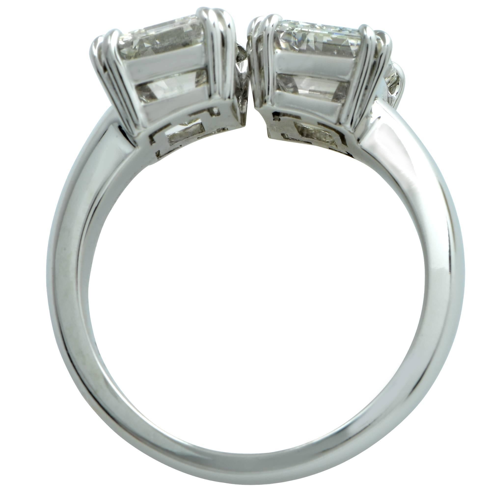 Modern Vivid Diamonds 4.02 Carat Emerald Cut Diamond Platinum Bypass Ring