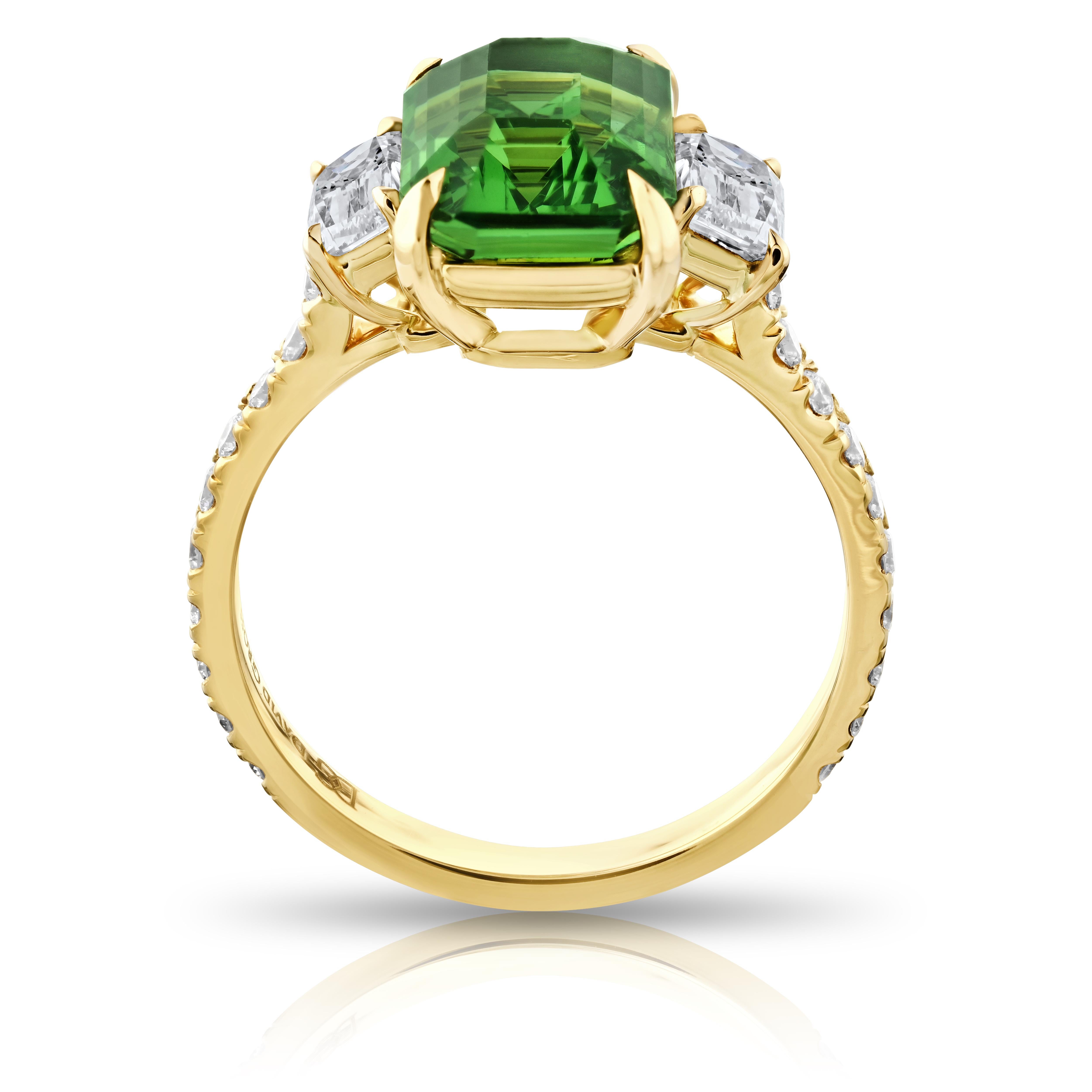 4.02 carat Emerald Cut Green Tsavorite with Diamonds 0.64 carats set in a handmade 18k YG ring