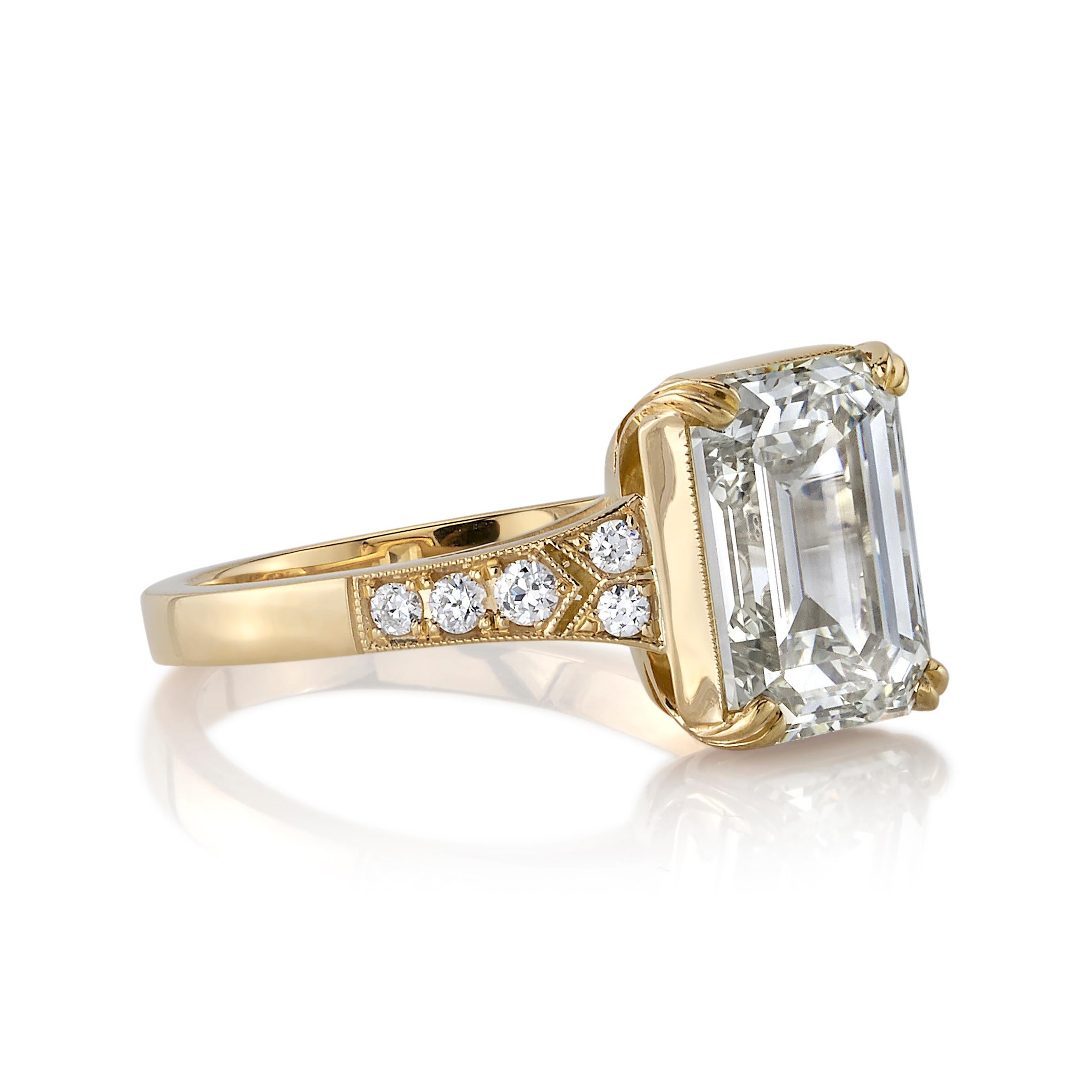 4.02ctw ST/VS2 GIA certified vintage Emerald cut diamond with 0.16ctw accent diamonds set in a handcrafted 18K yellow gold mounting.

Ring is currently a size 6 and can be sized to fit.