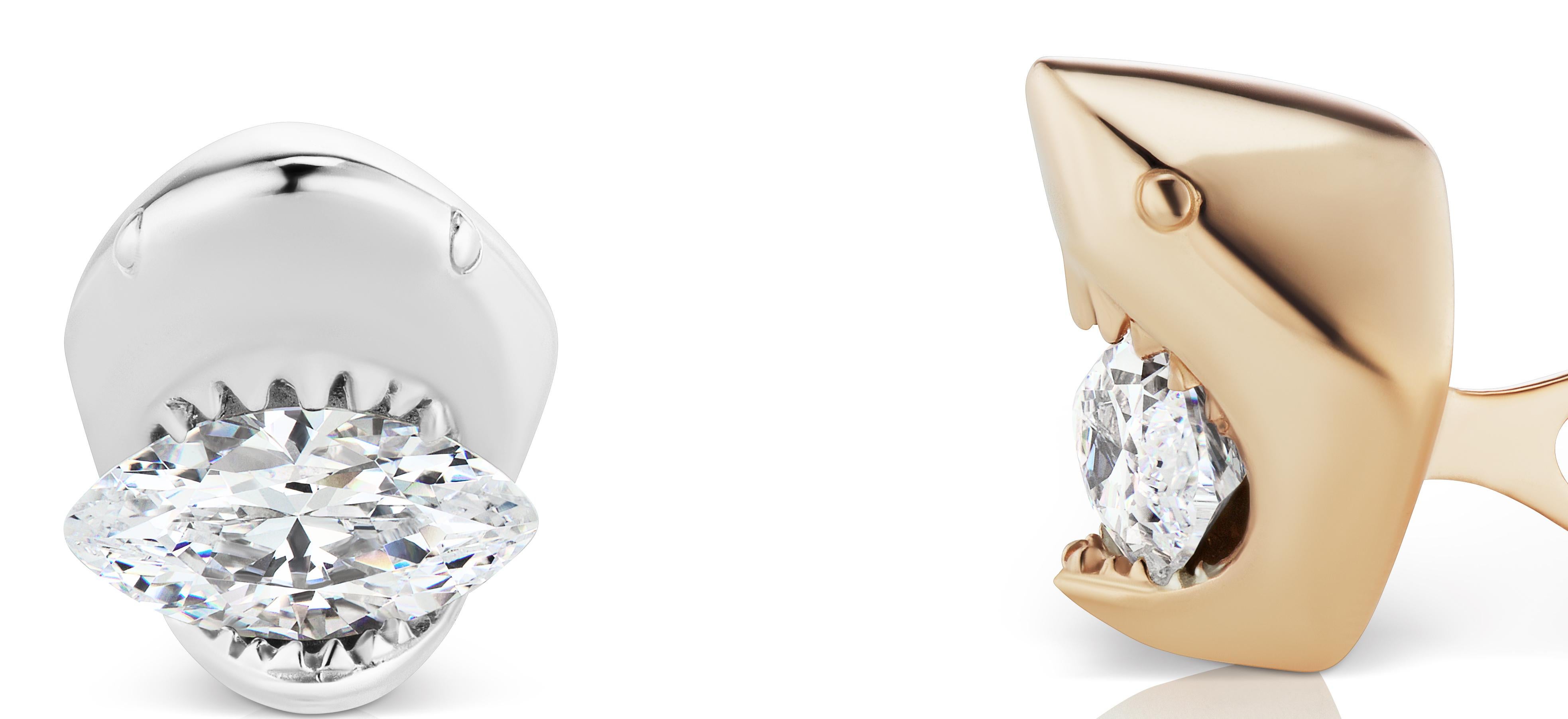 El Gemelo Definitivo para el Tiburón Definitivo. D Diamantes sin defectos.

Cada Diamante pesa 2 Quilates Engarzados entre los Dientes del Tiburón. 
Uno en oro blanco de 18 quilates y el otro en oro rosa de 18 quilates.
Las piedras son de color D y