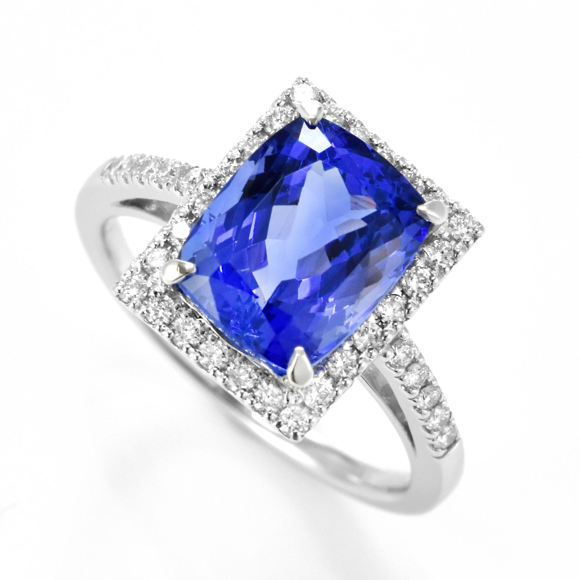 A beautiful ring featuring a 4.02 Carat Natural Tanzanite and 0.31 Carat Diamonds Made in Platinum. Tanzanite's name was given by Tiffany and Co after its only known source: Tanzania. Tanzanite displays beautiful pleochroic colors meaning they