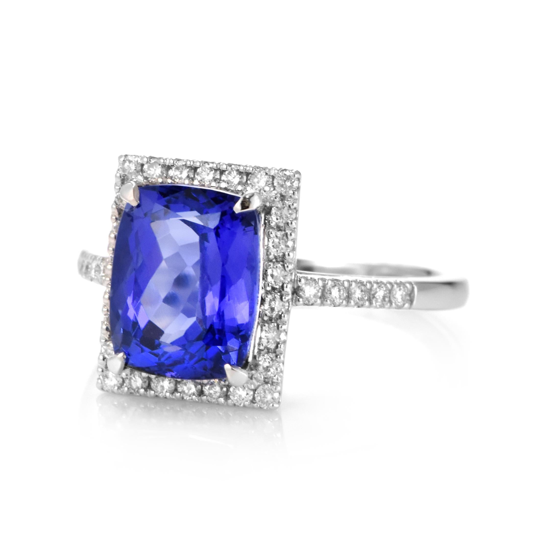 Modern 4.02 Carat Natural 'AAA' Tanzanite and Diamond Ring Made in Platinum For Sale
