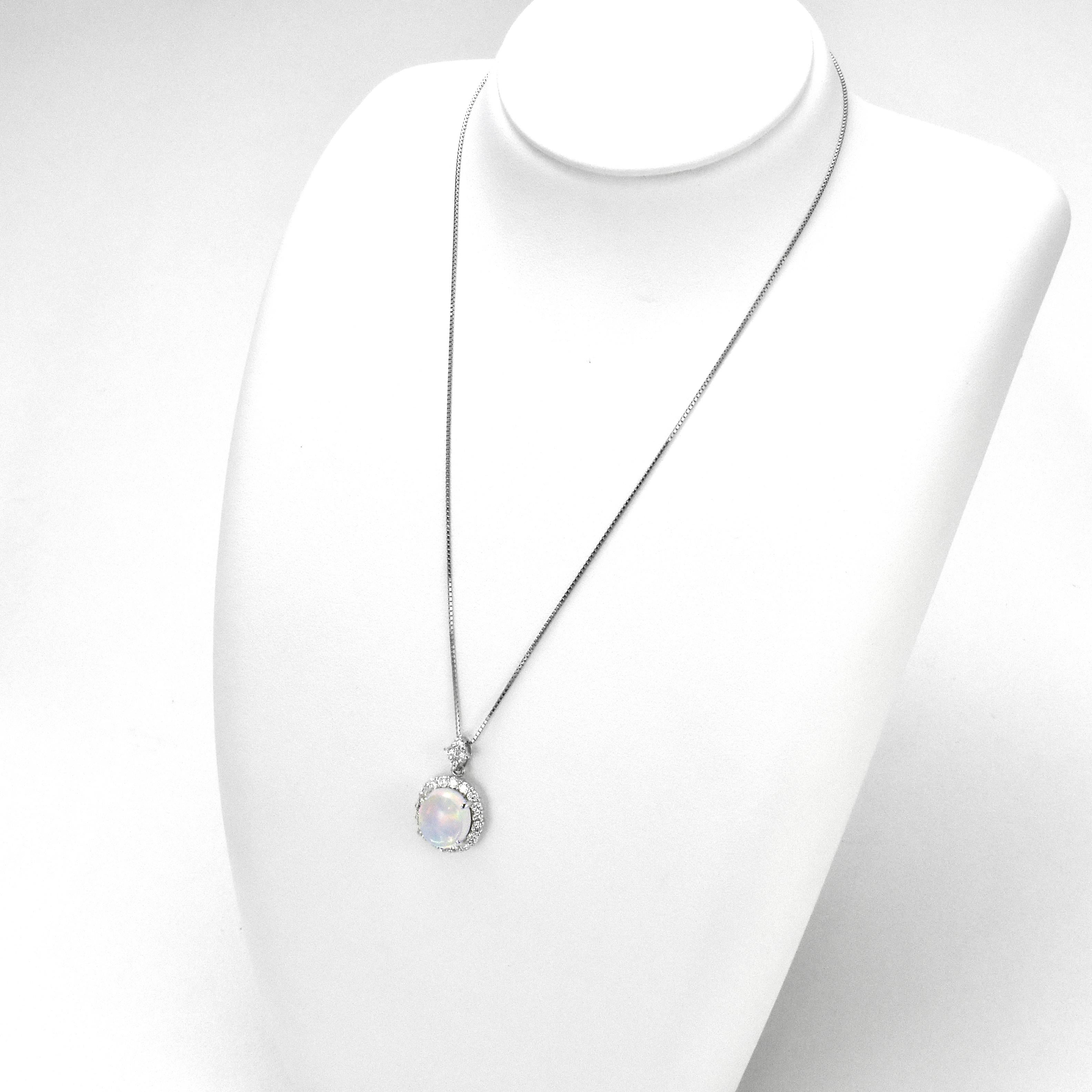 Modern 4.02 Carat Natural Caribbean Water Opal and Diamond Pendant Made in Platinum For Sale