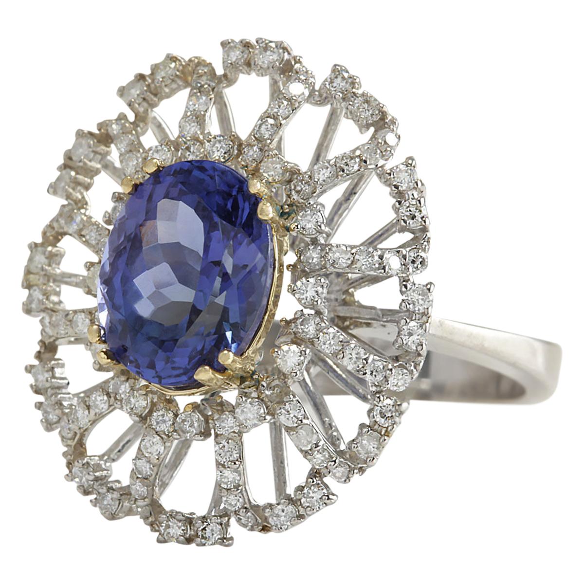 4.02 Carat Natural Tanzanite 14 Karat White Gold Diamond Ring
Stamped: 14K White Gold
Total Ring Weight: 6.8 Grams
Total Natural Tanzanite Weight is 3.42 Carat (Measures: 10.00x8.00 mm)
Color: Blue
Total Natural Diamond Weight is 0.60 Carat
Color: