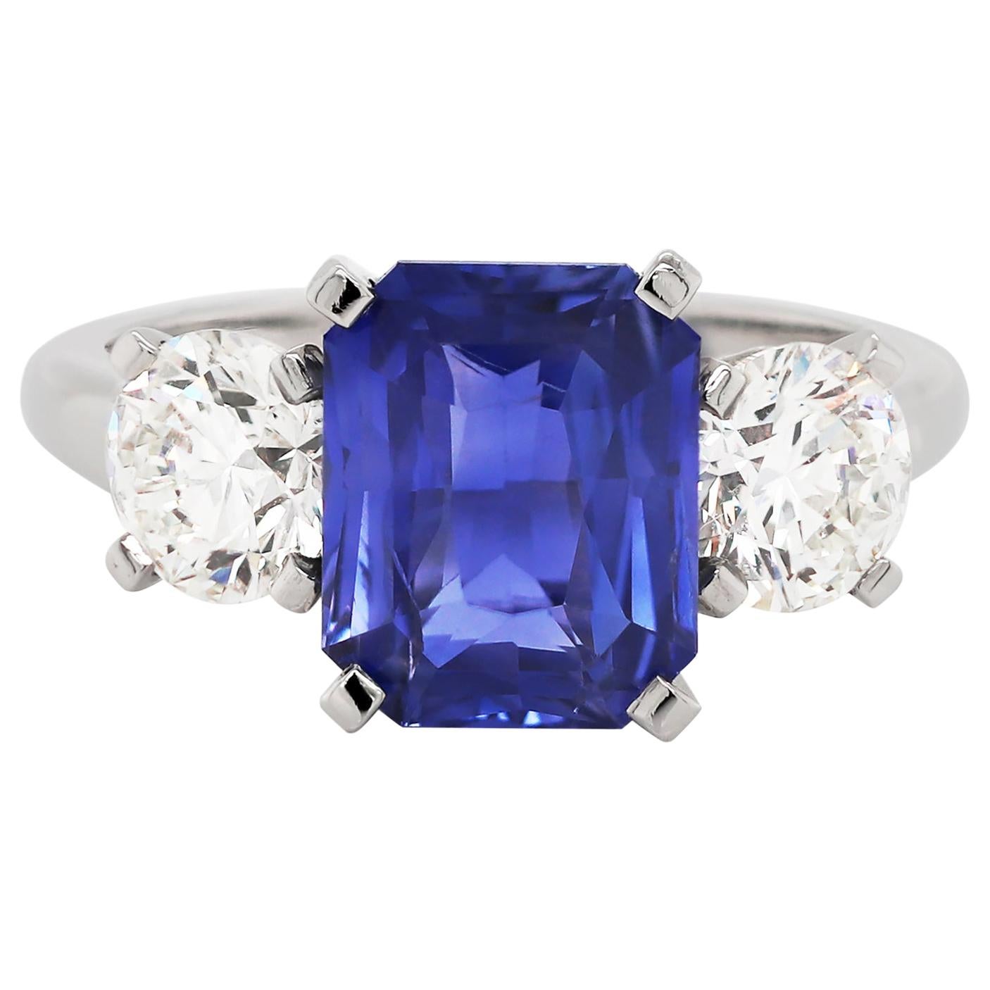 4.02 Carat Natural Unheated Sapphire and Diamond Three-Stone Platinum Ring For Sale