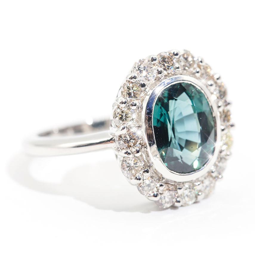 Oval Cut 4.02 Carat Oval Unheated Colour Shift Sapphire and 1.18 Carat Diamond Halo Ring