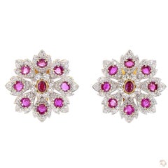 Orecchini in oro rosa con diamanti taglio brillante rotondo da 4.02 carati