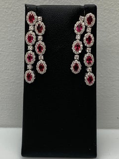 4.02 Carats Oval Cut Ruby and Diamond Halo Dangle Earring in 14K White Gold