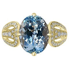 Bague en aigue-marine 4,02 carats et diamants 0,3 carat sertis en or jaune 14 carats