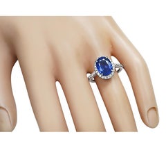 Verlobungsring aus Platin mit 4,02 Karat Saphir und 0,40 Karat Diamanten im Halo-Design
