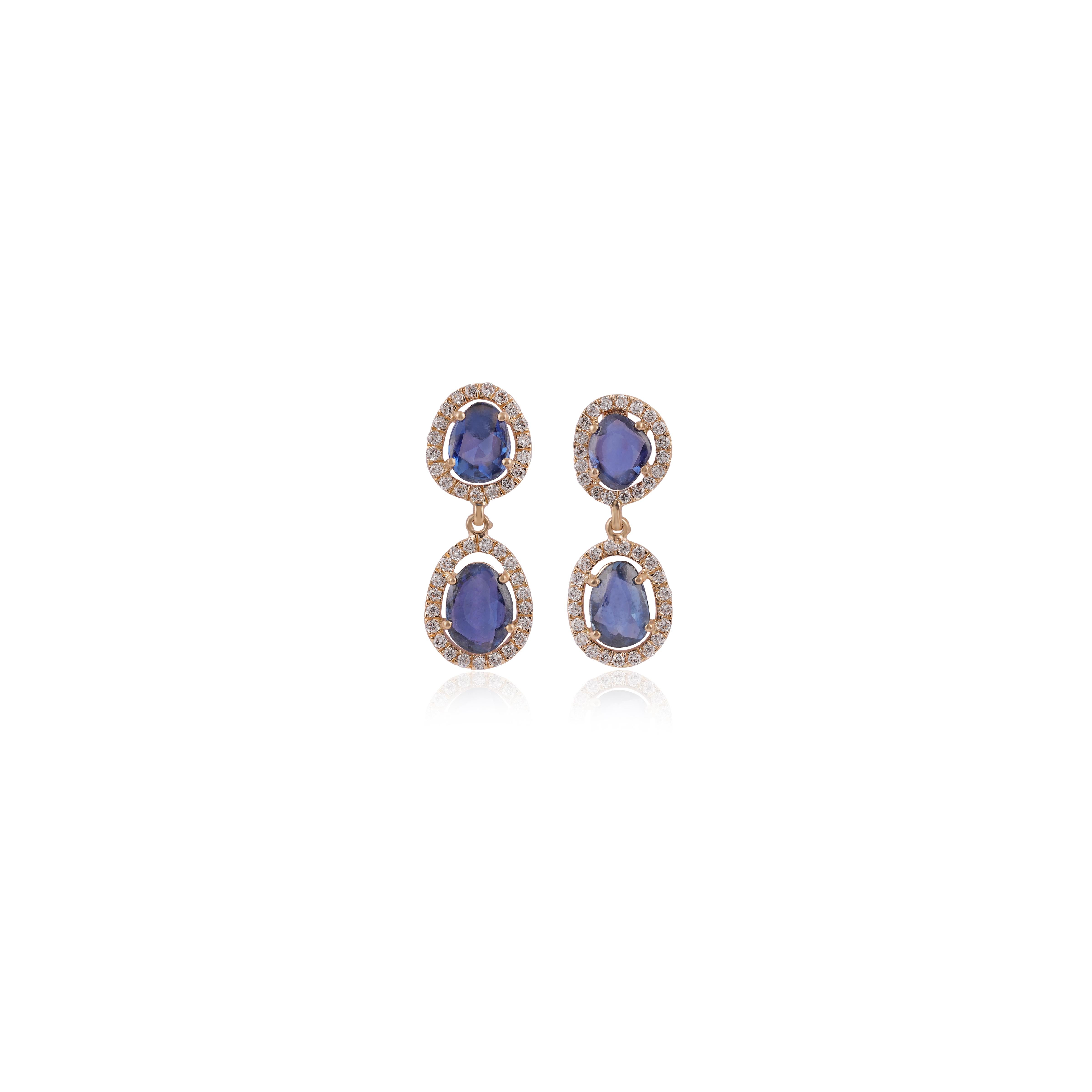 An exclusive pair of earrings with rose cut blue sapphire 4.03 carat in the cluster with a round-shaped diamond 0.65 carat studded in 18K Yellow gold 3.69 grams with a simple pull-push mechanism. These are elegant & wearable earrings.

