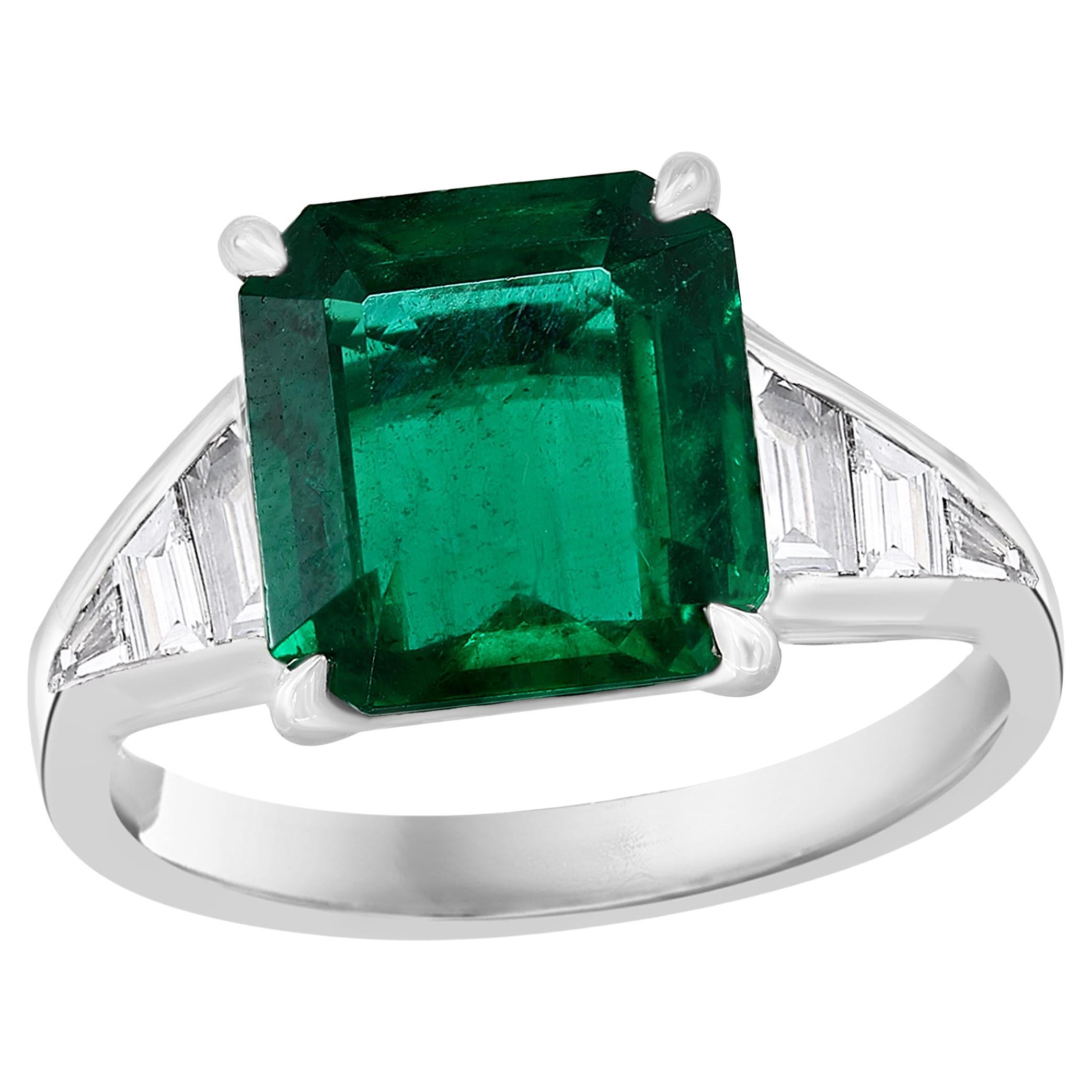 4.03 Carat Emerald Cut Emerald and Diamond Engagement Ring in Platinum