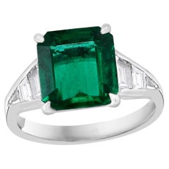4.03 Carat Emerald Cut Emerald and Diamond Engagement Ring in Platinum