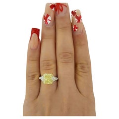4.03-carat GIA Certified Fancy Yellow diamond ring