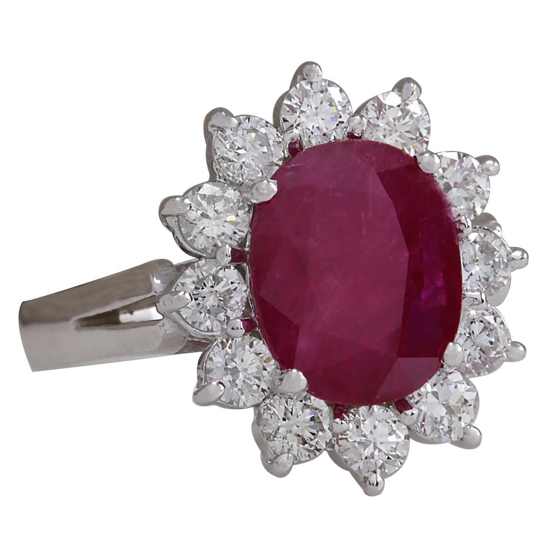 Stamped: 14K White Gold
Total Ring Weight: 4.6 Grams
Total Natural Ruby Weight is 3.03 Carat (Measures: 10.00x8.00 mm)
Color: Red
Total Natural Diamond Weight is 1.00 Carat
Color: F-G, Clarity: VS2-SI1
Face Measures: 16.70x14.65 mm
Sku: [702771W]