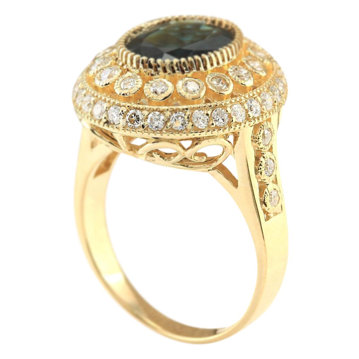 Oval Cut Sapphire Diamond Ring In 14 Karat Yellow Gold For Sale