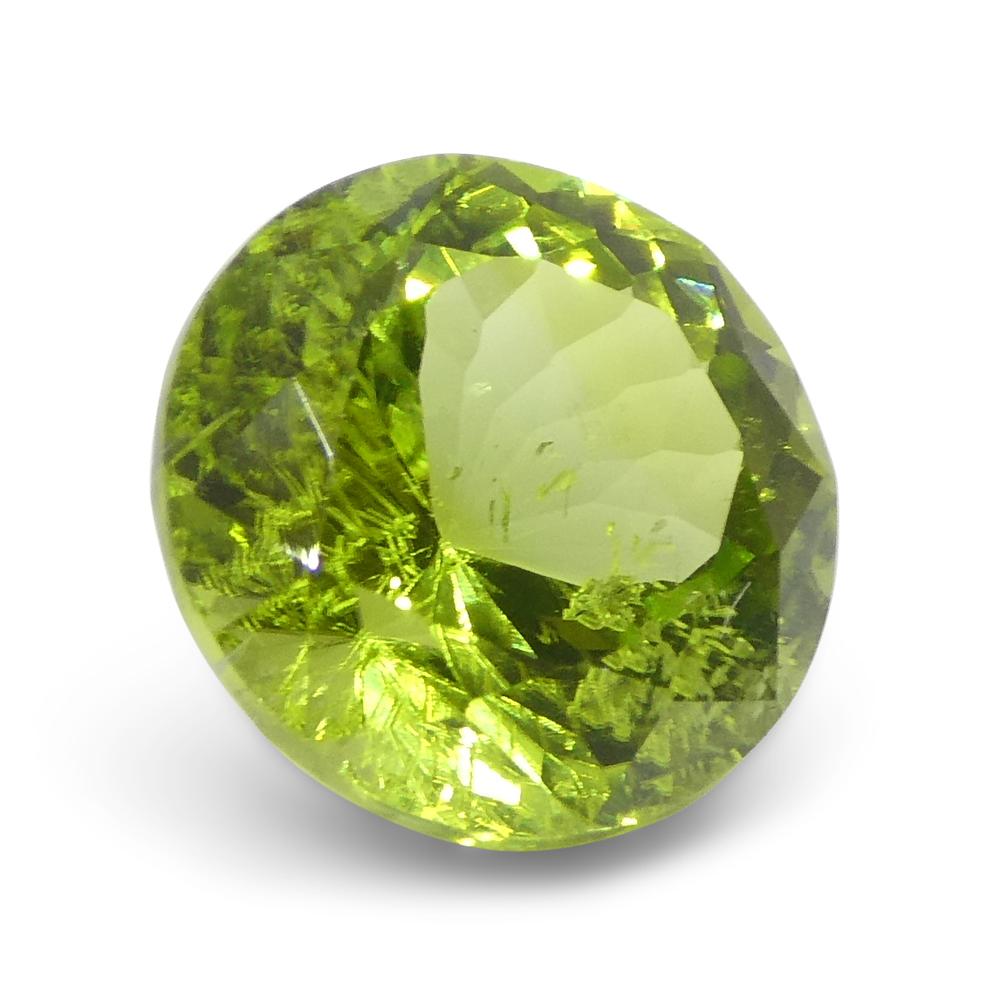 Péridot vert jaunâtre rond de 4,03ct en vente 5