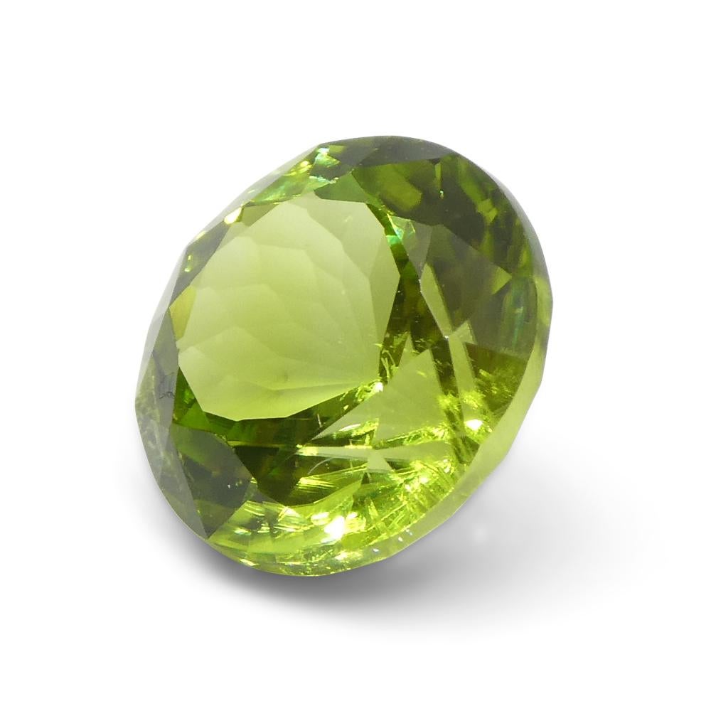 Péridot vert jaunâtre rond de 4,03ct en vente 7