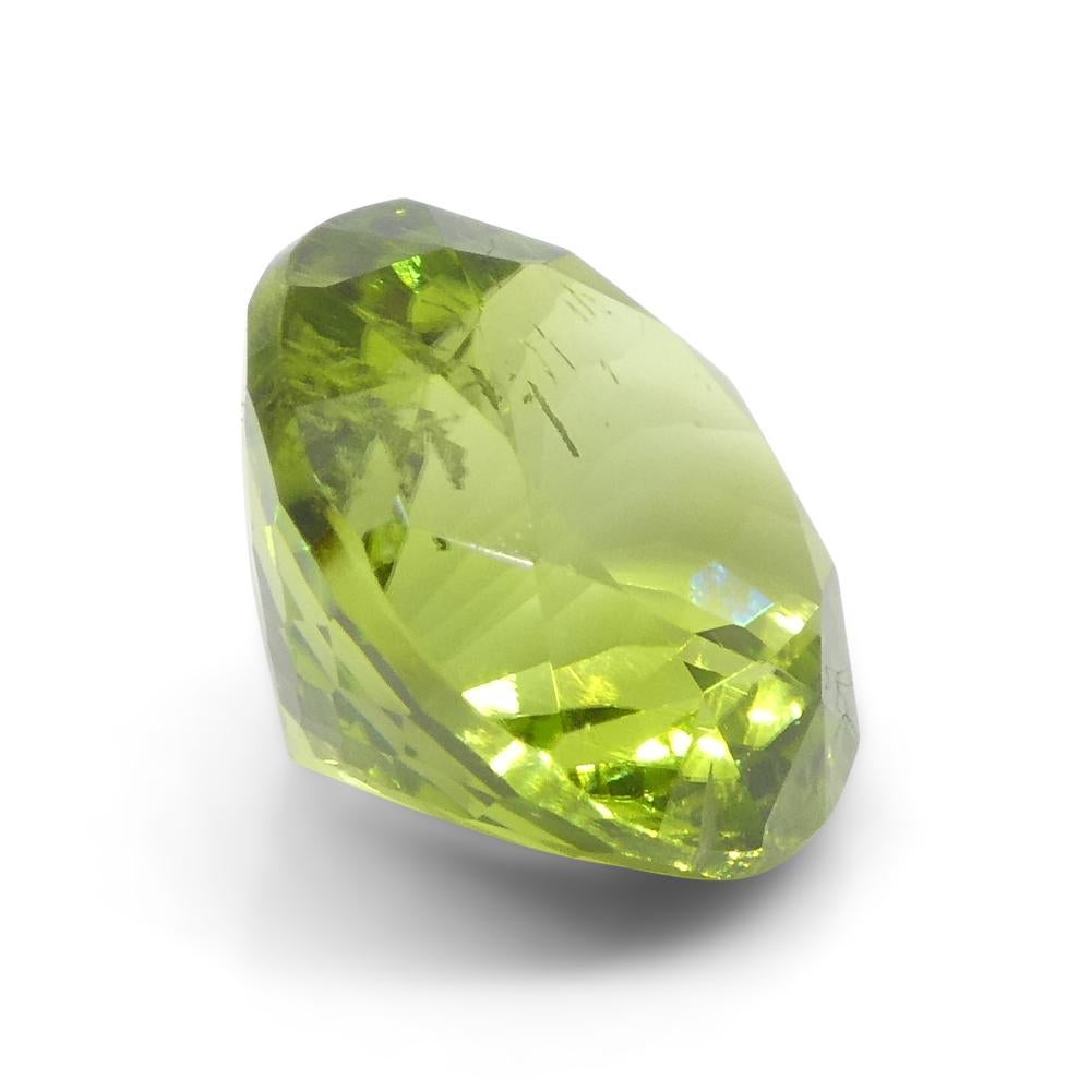 Péridot vert jaunâtre rond de 4,03ct en vente 8