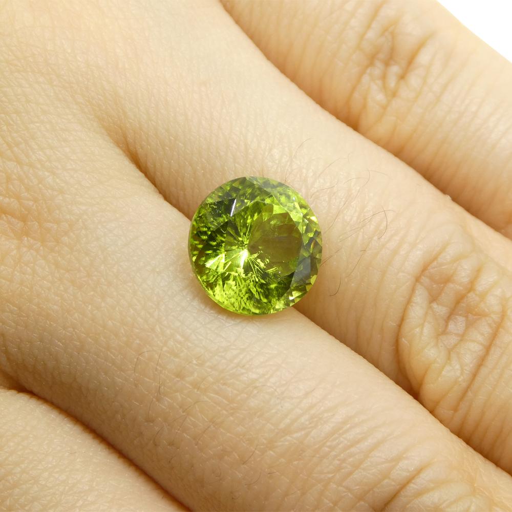 Description:

Gem Type: Peridot
Number of Stones: 1
Weight: 4.03 cts
Measurements: 9.68 x 9.66 x 6.54 mm
Shape: Round
Cutting Style Crown: Brilliant Cut
Cutting Style Pavilion: Brilliant Cut
Transparency: Transparent
Clarity: Very Slightly Included: